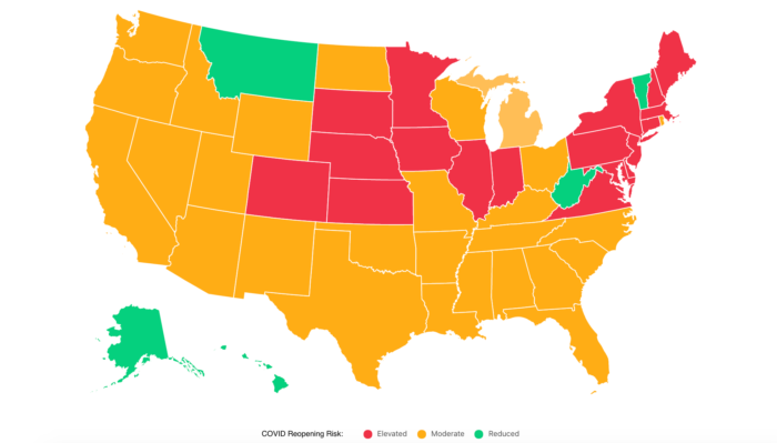 Map of America and where Covid-19 risks are by state, using green, red, and yellow color coding.